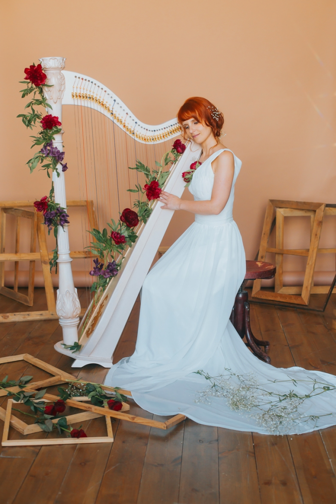 Harp. Harpist Olga Logacheva.